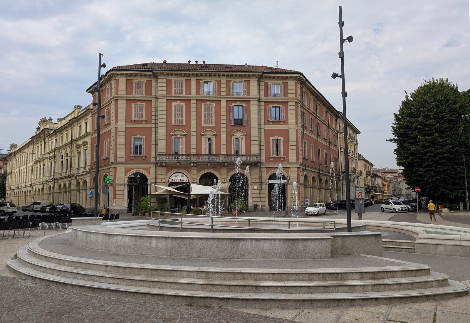 Piazza Italia in Acqui Terme with its arcaded palazzo and central fountain