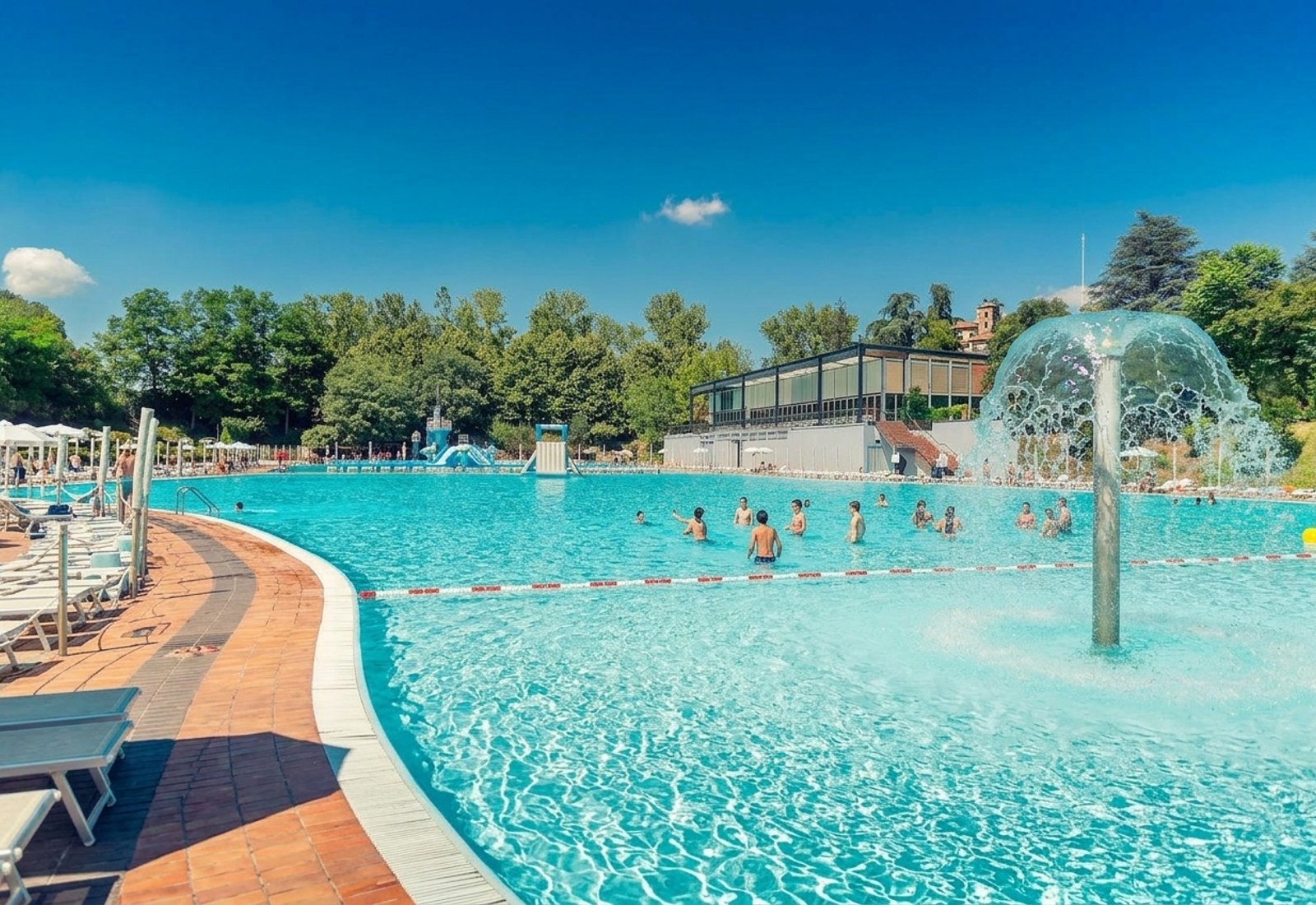 The open-air thermal swimming pools of Acqui Terme on a sunny day